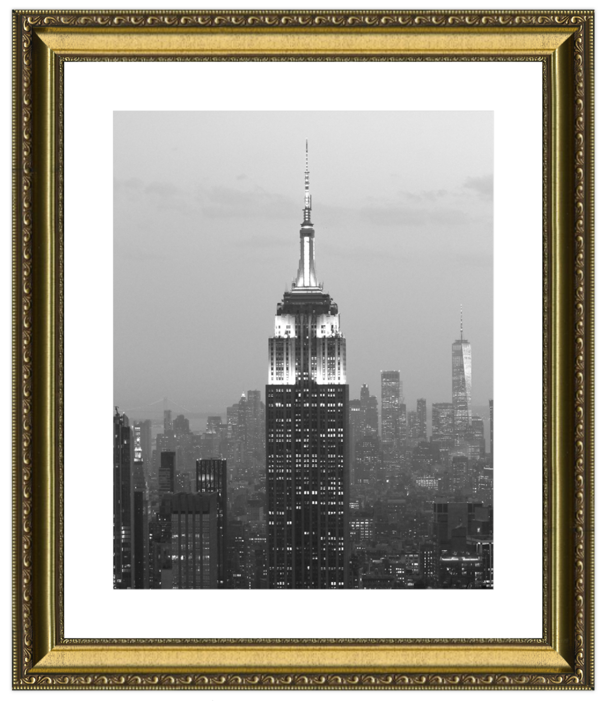 Framed black and white photo of a city skyline with a prominent building, likely the Empire State Building, at dusk.