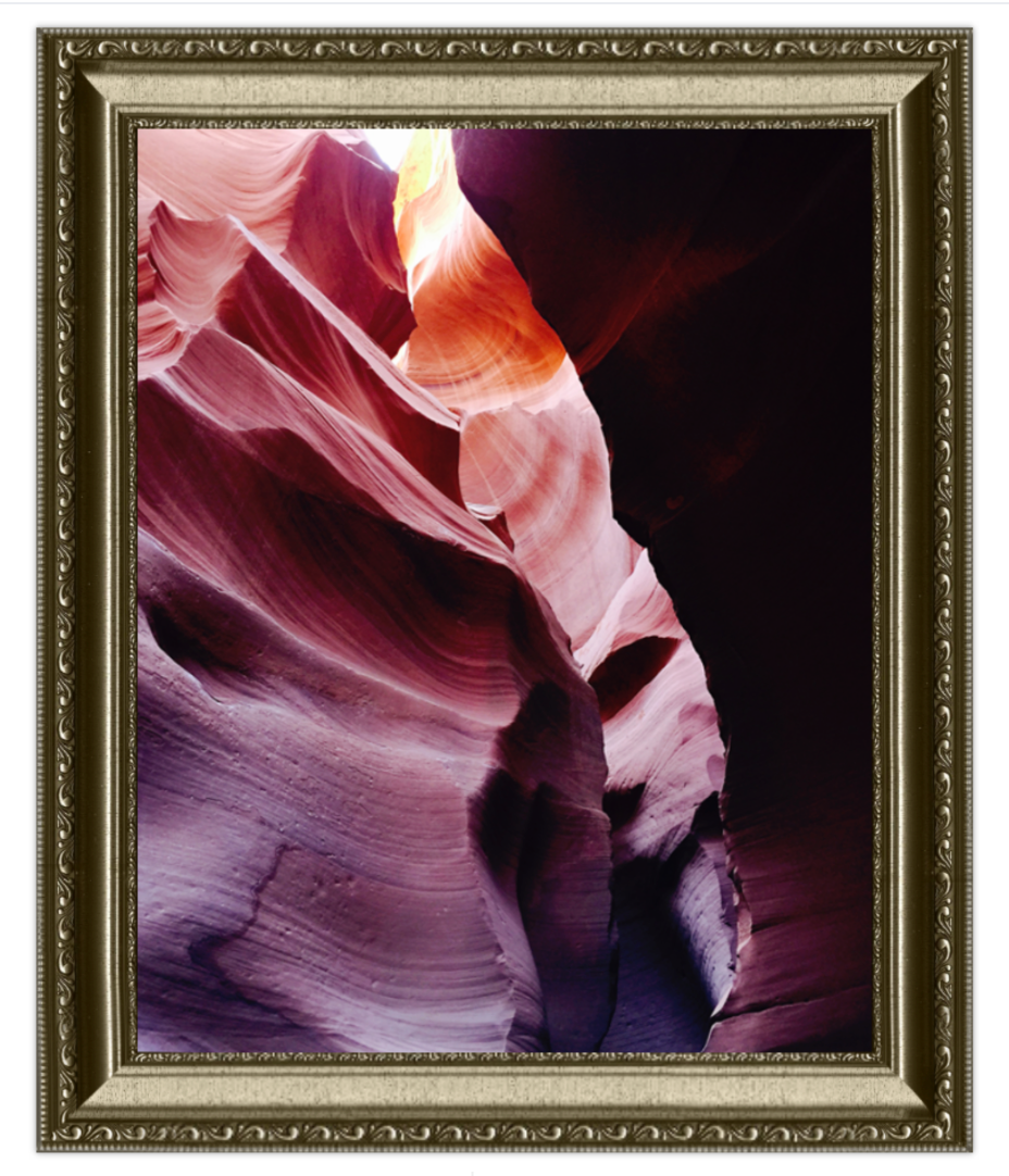 Framed photograph of a sandstone formation in a canyon