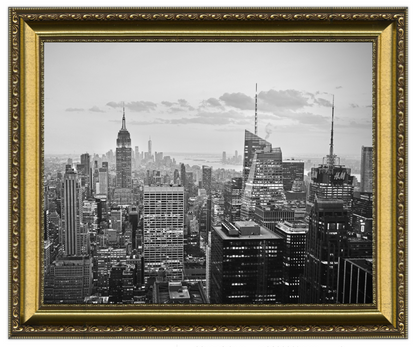 Framed black and white cityscape with tall buildings