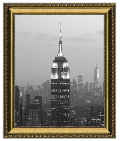 Framed black and white photo of a city skyline with a prominent skyscraper.