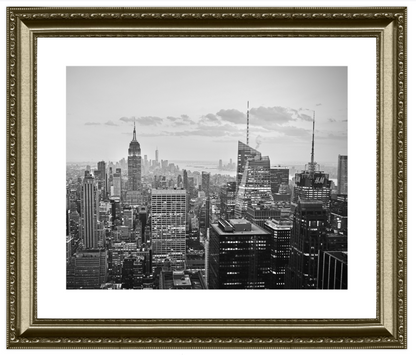Framed black and white cityscape print with detailed frame