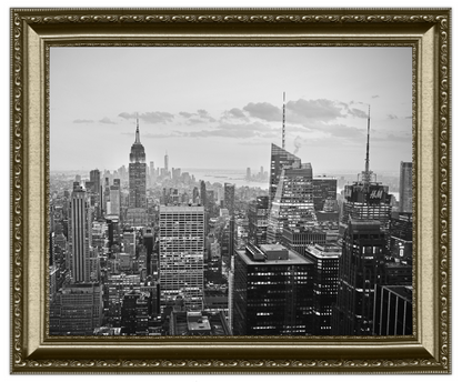 Framed black and white cityscape with tall buildings