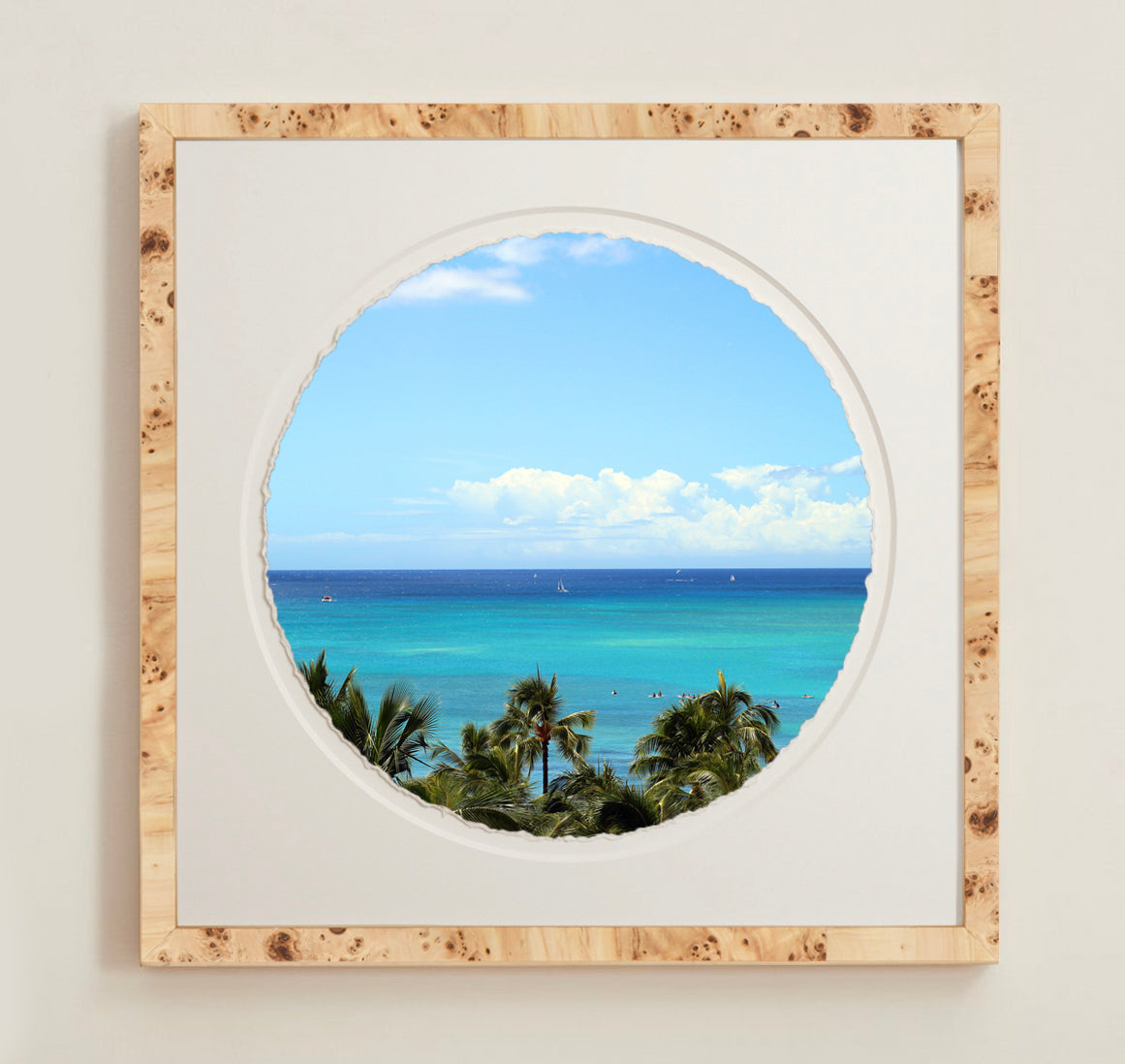 A collection of framed artwork prints with a deckled edge appearance, displayed in two museum style frames named Light Burlwood and Dark Burlwood. The frames are pictured in various sizes with a white mat and clear acrylic front.