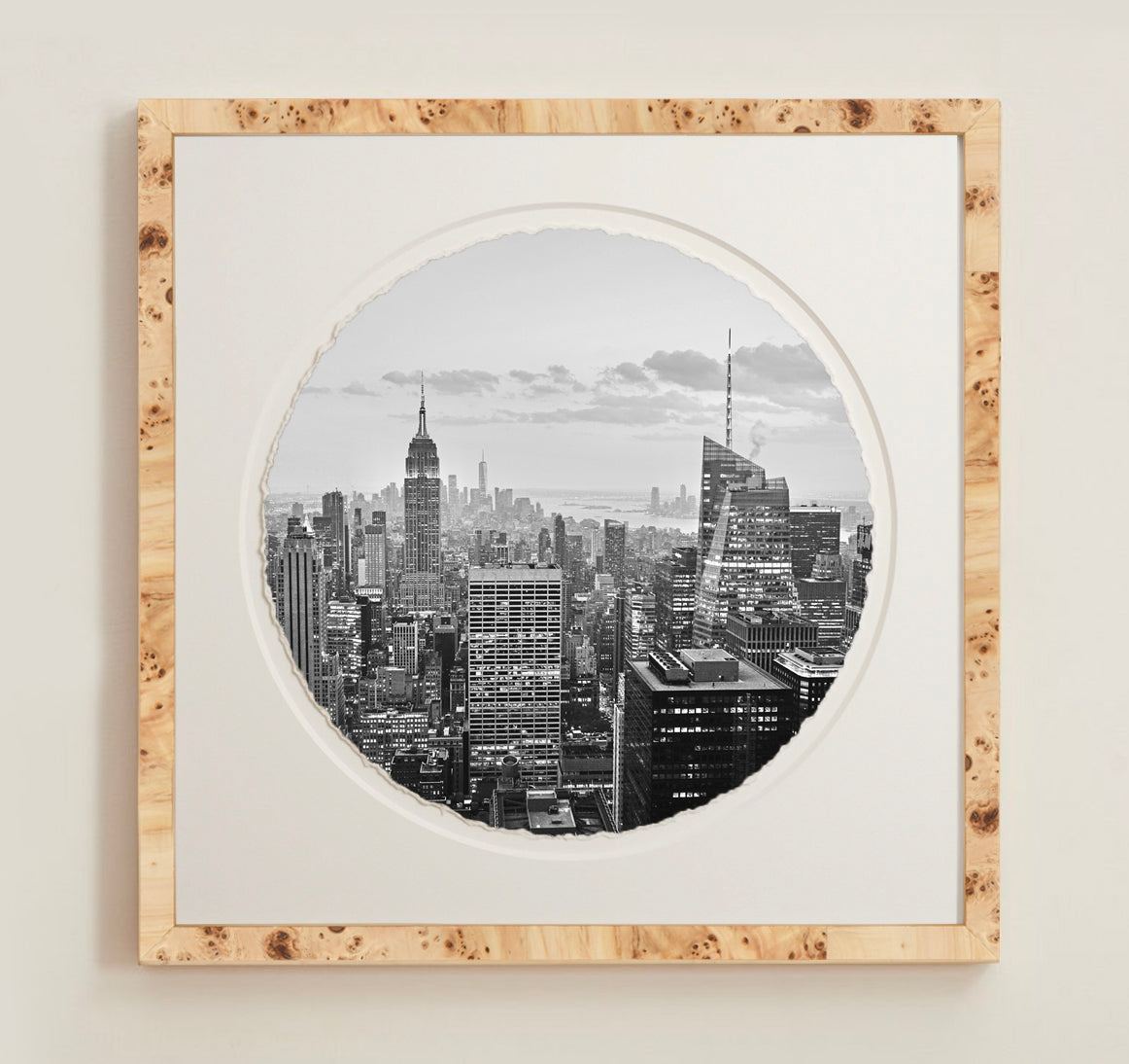 A collection of framed artwork prints with a deckled edge appearance, displayed in two museum style frames named Light Burlwood and Dark Burlwood. The frames are pictured in various sizes with a white mat and clear acrylic front.