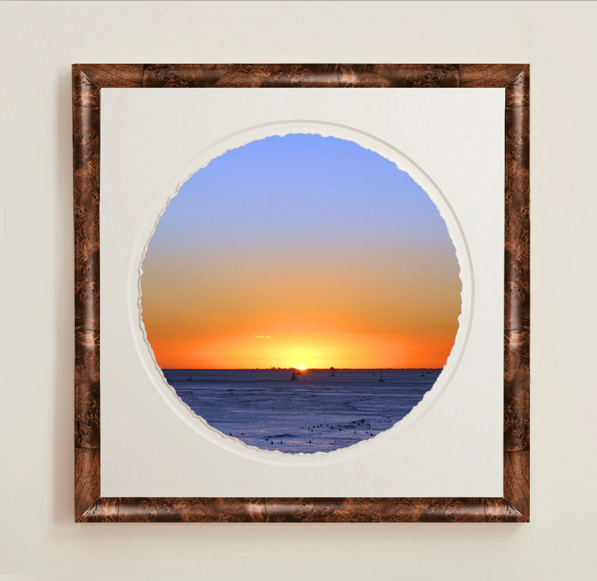 A collection of framed artwork prints with a deckled edge appearance, displayed in two museum style frames named Light Burlwood and Dark Burlwood. The frames are pictured in various sizes with a white mat and clear acrylic front.