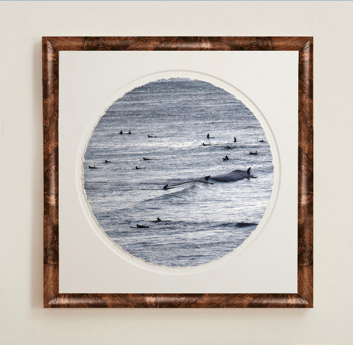 A collection of framed artwork prints with a deckled edge appearance, displayed in two museum style frames named Light Burlwood and Dark Burlwood. The frames are pictured in various sizes with a white mat and clear acrylic front.