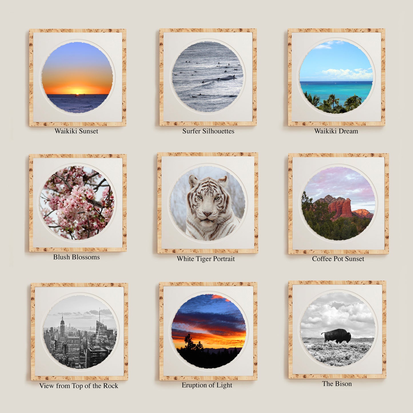 Set of framed prints with various landscapes and nature scenes on a wall.