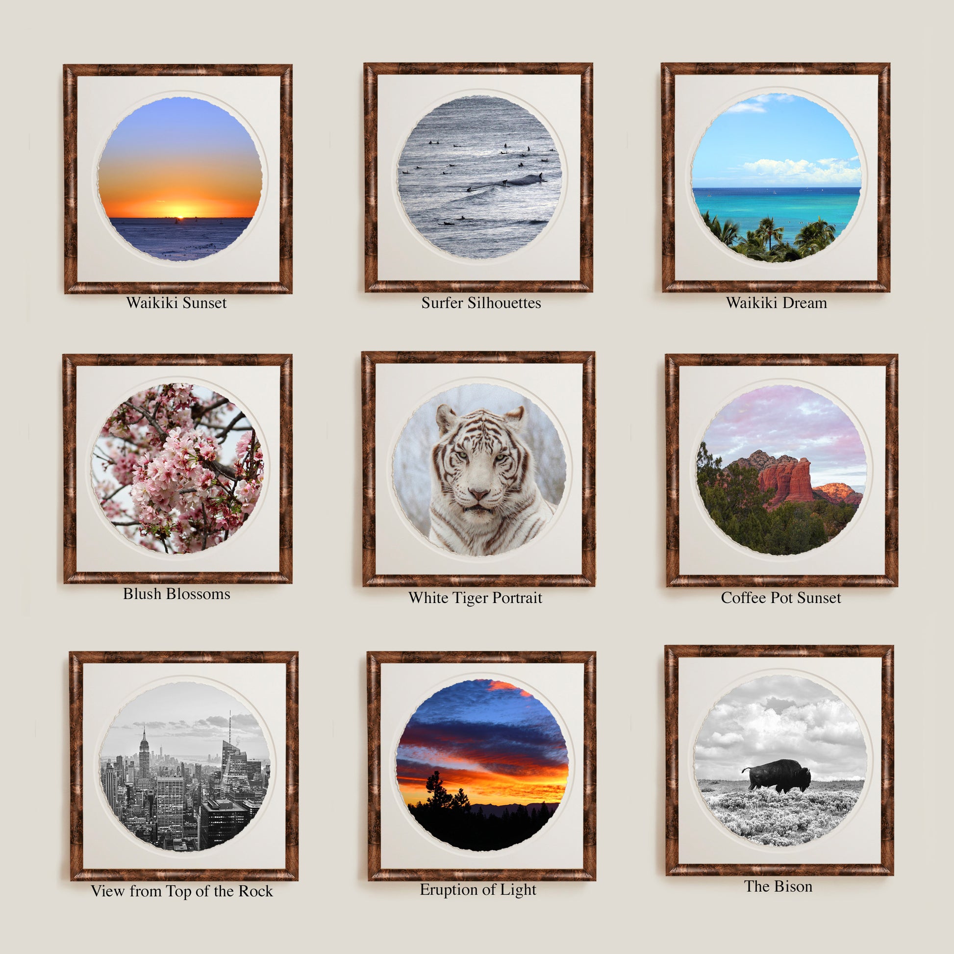 Collection of framed prints on a wall with various landscapes and subjects.