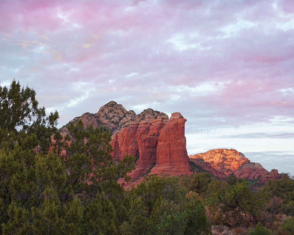 pink sunset over coffee pot rock in sedona